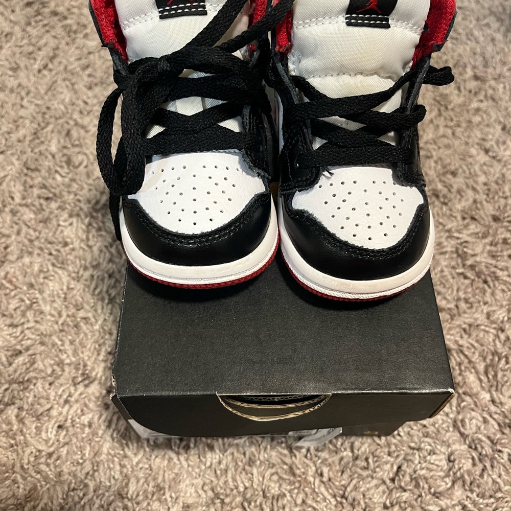 Jordan Kids' Black, White, and Red Sneakers